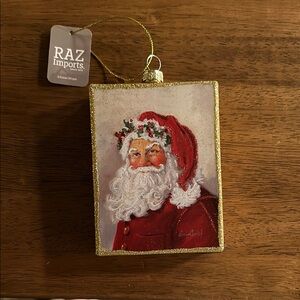 Red and Gold Christmas Ornaments featuring Santa Claus